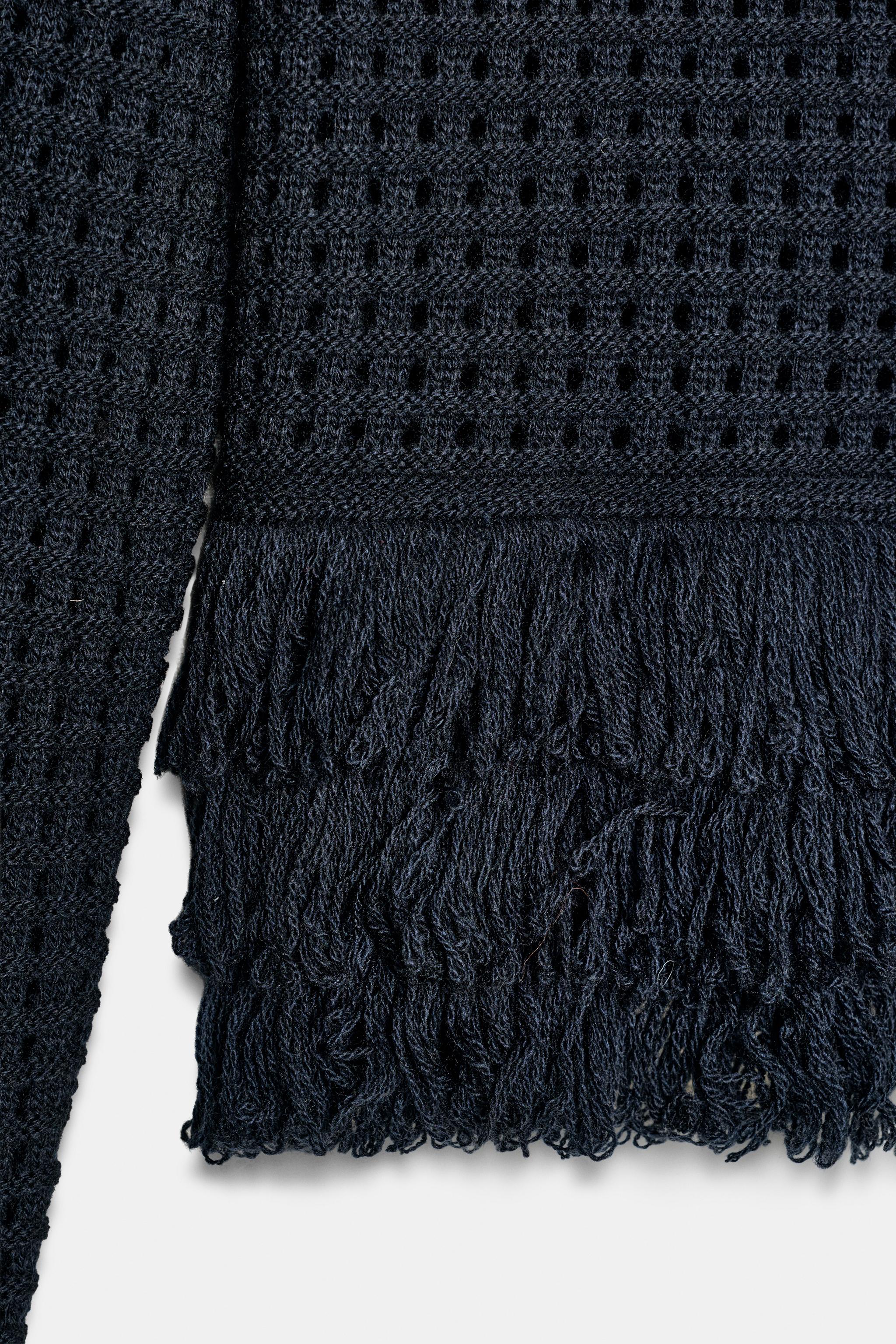 PULL EN MAILLE QUADRILLÉE À FRANGES